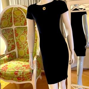 Authentic Chanel black classic Camellia dress.